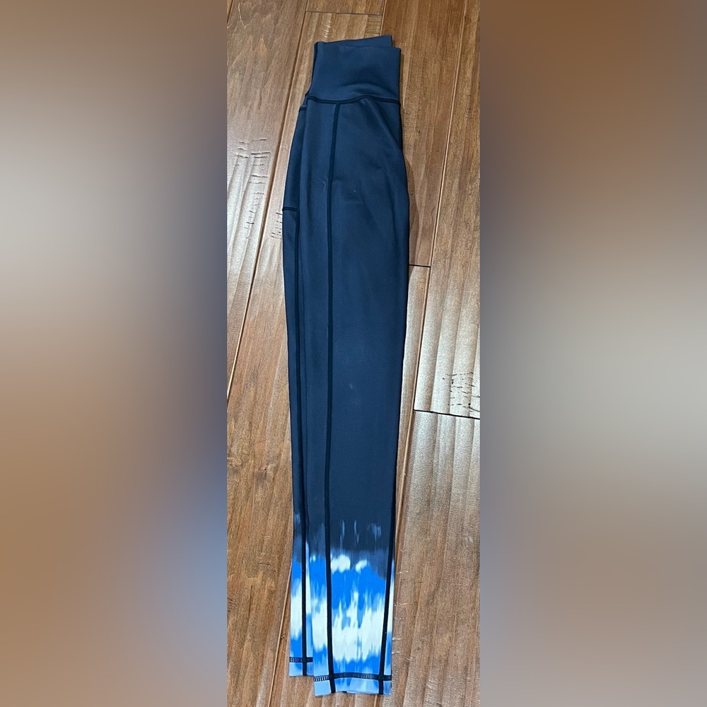 sweaty betty navy, white, and blue fade leggings.